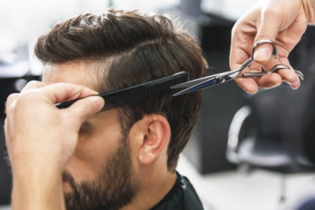 A man receiving a haircut.